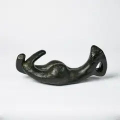 Liegende by Anton Räderscheidt, Bronze, dunkelbraun und teilweise grün patiniert, sold Jan 2025