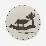 Taureau sous l’Arbre plate by Pablo Picasso, 1952, white earthenware clay, oxidized paraffin decoration, sold Apr 2023