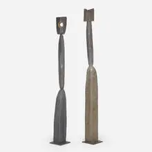 African, Totems, set of two, carved and painted wood, enameled steel