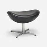 Egg ottoman by Arne Jacobsen, 1958, leather, cast aluminum, plastic, sold Oct 2021