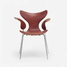 Seagull chair by Arne Jacobsen, 1969 / 1973, matte chrome-plated steel, leather, plastic, sold Oct 2021