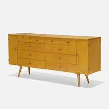 Planner Group cabinet, model 1510-9 by Paul McCobb, 1952, maple veneer, maple, enameled brass, sold Sep 2021