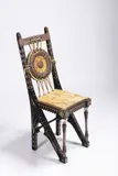 Carlo Bugatti, A Chair, Around 1900, Ebonized walnut, tin inlay, hammered and patinated brass, bone, painted rawhide, sisal