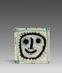 Mask by Pablo Picasso Ceramics, 1956, Weißes Steingut, partiell farbig gefasst und glasiert, sold Nov 2024