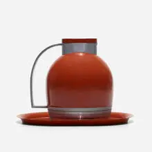 Carafe and tray, model 549 by Henry Dreyfuss, 1935, enameled aluminum, enameled steel, sold Sep 2021