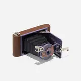 Walter Dorwin Teague, Kodak Petite camera, 1927 / 1930, vinyl, enameled steel, plastic, chrome-plated steel