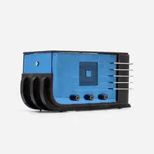 Sparton radio, model 557 by Walter Dorwin Teague, c. 1936, midnight blue Tufflex mirrored glass, chrome-plated steel, lacquered wood, Bakelite, sold Sep 2021