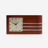 Gilbert Rohde, World's Fair table clock, model 4082, c. 1933, Maidou burl, chrome-plated steel, enameled aluminum, glass