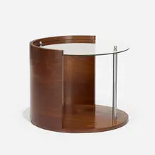 Occasional table, No. 134251 by Gilbert Rohde, 1936, East Indian laurel, glass, chrome-plated steel, sold Sep 2021