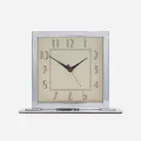 Gilbert Rohde, Table clock, c. 1935, chrome-plated aluminum and steel, glass, enameled aluminum