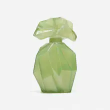 Ruba Rombic perfume bottle by Reuben Haley, c. 1930, mold-blown glass, sold Sep 2021