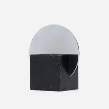 Cube cigarette holder, model 17070 by Walter von Nessen, c. 1930, enameled and chrome-plated brass, sold Sep 2021