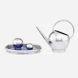 Russel Wright, Pancake and Corn set, c. 1935, chrome-plated brass, glass