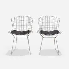 Dining chairs, pair by Harry Bertoia, 1952, chrome-plated steel, vinyl, sold Sep 2021