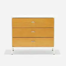 Steelframe cabinet by George Nelson & Associates, 1950, laminate, lacquered masonite, lacquered wood, enameled steel, aluminum, sold Sep 2021