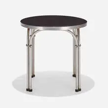 Dining table by Warren McArthur, 1968, laminate, aluminum, rubber, sold Sep 2021