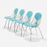 DKX-2s, set of four by Charles and Ray Eames, 1951, enameled steel, zinc-plated steel, leather, sold Sep 2021