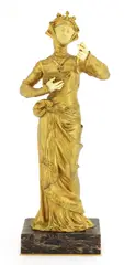 Xavier Raphanel, Xavier Raphanel (French, 1876, a gilt-bronze and ivory figure