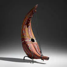 Untitled (from the Cocoe series) by Davide Salvadore, c. 2010, hand-blown glass, inciso and battuto surface, leather string, patinated metal, sold Feb 2025