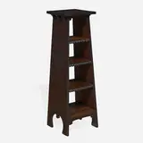 Early chalet magazine stand, model 500 by Gustav Stickley, c. 1901, oak, leather, iron, sold Dec 2022
