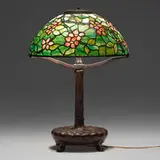 Apple Blossom table lamp by Tiffany Studios, c. 1910, leaded glass, patinated bronze, sold Dec 2022