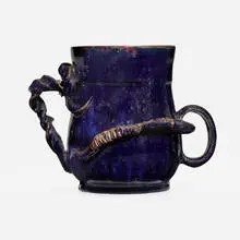 Rare snake vase by George E. Ohr, 1896, glazed earthenware, sold Jan 2025