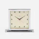 Gilbert Rohde, Table clock, c. 1935, chrome-plated aluminum, chrome-plated steel, glass, enameled aluminum