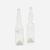 Salt and pepper shakers from Pharmacy by Damien Hirst, 1997-98, glass, sold Jul 2021