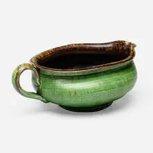 Pitcher by George E. Ohr, 1897-1900, glazed earthenware, sold Jan 2025