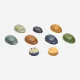 Grueby Faience Company, Collection of nine scarab paperweights