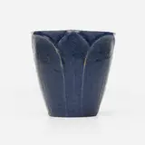 Blue vase with leaves by Ruth Erickson for Grueby Faience Company, 1899-1910, glazed earthenware, sold Jan 2025