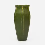 Vase with leaves and buds by Marie Seaman for Grueby Faience Company, 1898-1910, glazed earthenware, sold Jan 2025