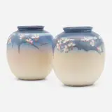 Vellum vases with cherry blossoms, pair by Edward T. Hurley for Rookwood Pottery, 1944, glazed porcelain, sold Nov 2022
