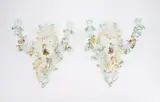 Paar Appliken mit Amoretten by Meissen, 20. Jh, Porzellan, farbig staffiert, gold dekoriert, sold May 2025