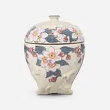 Ivory Jewel Porcelain lidded jar with dragon feet and apple blossoms by Sara Sax for Rookwood Pottery, sold Nov 2022