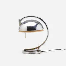 Desk lamp by Gilbert Rohde, c. 1934, chrome-plated metal, enameled aluminum, sold Feb 2021