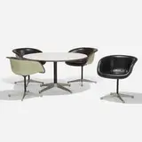 Dining set by Charles and Ray Eames, 1957, fiberglass, aluminum, vinyl, enameled aluminum, rubber, laminate, plastic, sold Feb 2021