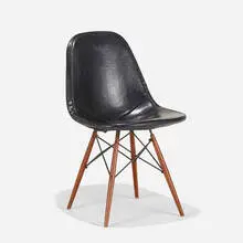 DKW-1 by Charles and Ray Eames, 1951, enameled steel, leather, birch, sold Feb 2021