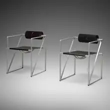 Mario Botta, Seconda amrchairs, pair, 1982, enameled and perforated steel, rubber