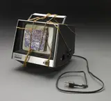 Shigeko Kubota, Berlin Diary: Thanks to My Ancestors, 1981, television, blue ink on pink crystal, and twine