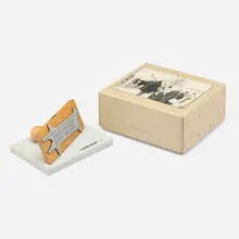 Unter den Linden (Parkett No. 42) by Lawrence Weiner, 1994, Rubber stamp and red ink pad in screenprinted cardboard box, sold Nov 2024