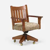 V-back swivel chair by Gustav Stickley, oak, upholstery, iron, casters, sold Oct 2022