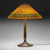 Greek Key table lamp by Tiffany Studios, c. 1910, leaded glass, patinated bronze, sold Oct 2022