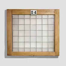 Window panel by Frank Lloyd Wright, c. 1900, glass tiles, oak, zinc, sold Oct 2022