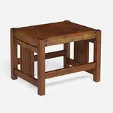 Spindle footstool, model 395 by Gustav Stickley, c. 1907, oak, leather, iron, sold Oct 2022