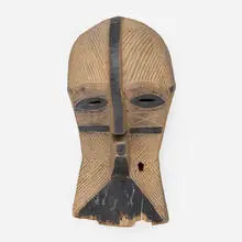 Kifwebe mask by Songye, carved and painted wood, sold Feb 2021