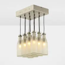Milk Bottle lamp by Tejo Remy & Rene Veenhuizen, 1991, brushed steel, sand-blasted glass, sold Nov 2020