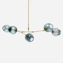 Lindsey Adelman, 5-globe Branching Bubble chandelier, 2016, brushed brass, grey glass