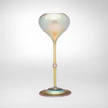 Ribbed floriform vase by Tiffany Studios, c. 1900-03, hand-blown Favrile glass, sold Oct 2024