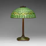 Vine Border (Acorn) table lamp by Tiffany Studios, c. 1910, leaded glass, patinated bronze, sold Oct 2024
